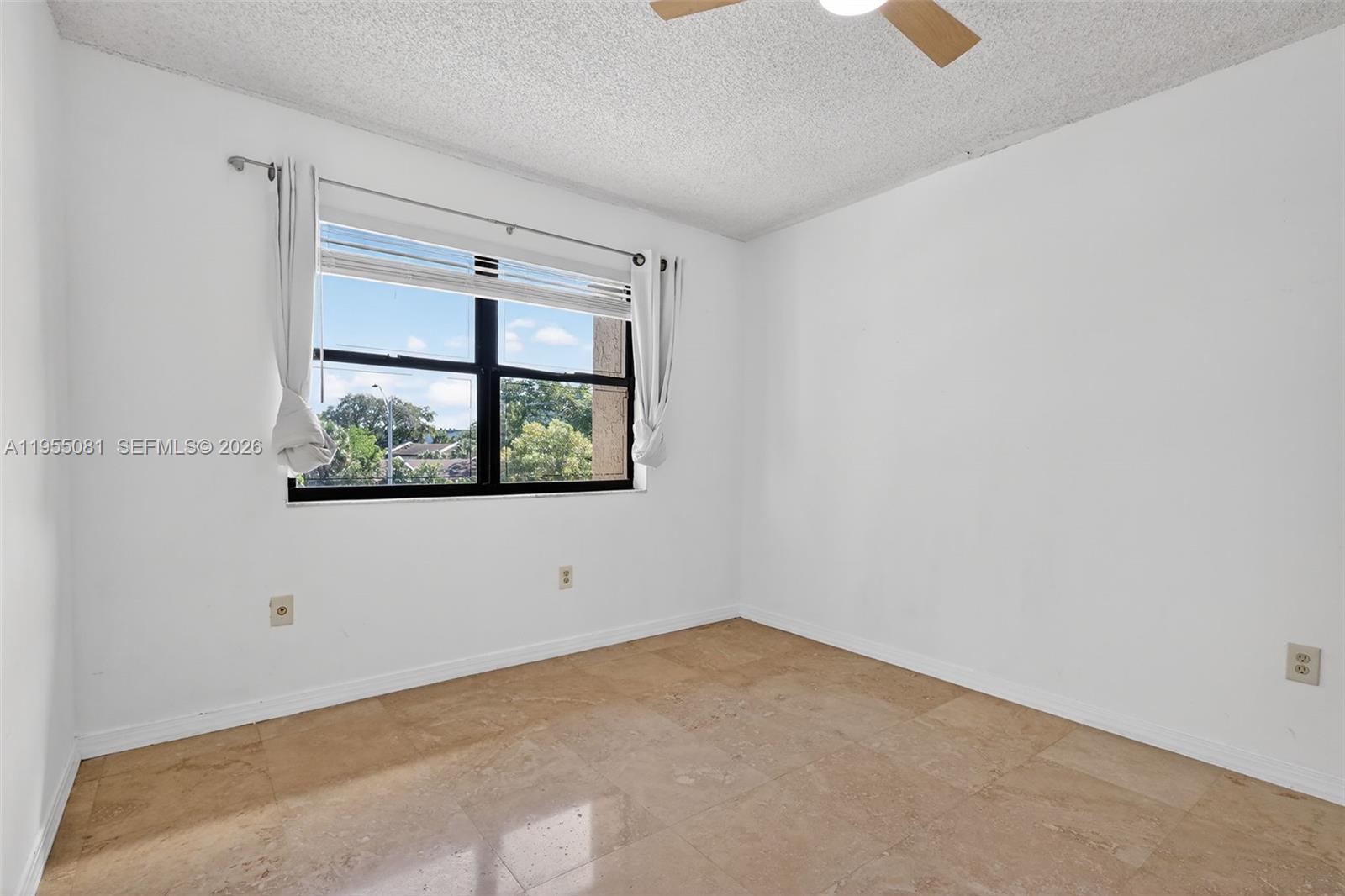 491 Ives Dairy Road, Unit 3065 Miami, FL 33179 - Photo 14 of 41 an empty room with a window