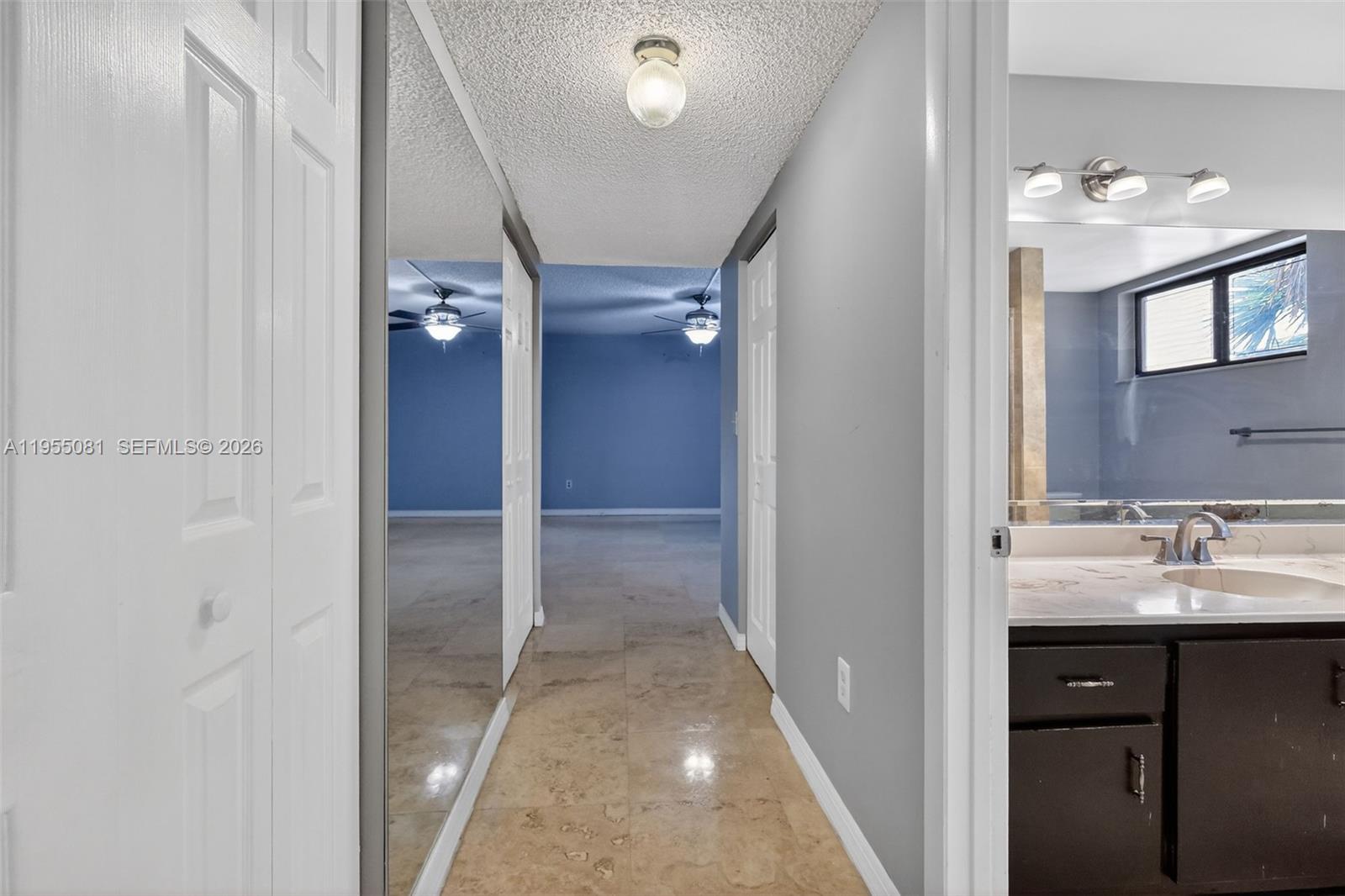 491 Ives Dairy Road, Unit 3065 Miami, FL 33179 - Photo 21 of 41 a bathroom with a sink and a mirror