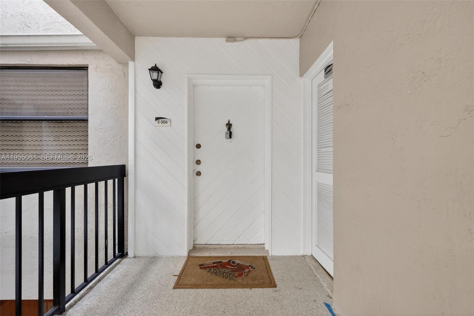 491 Ives Dairy Road, Unit 3065 Miami, FL 33179 - Photo 4 of 41 a view of a hallway