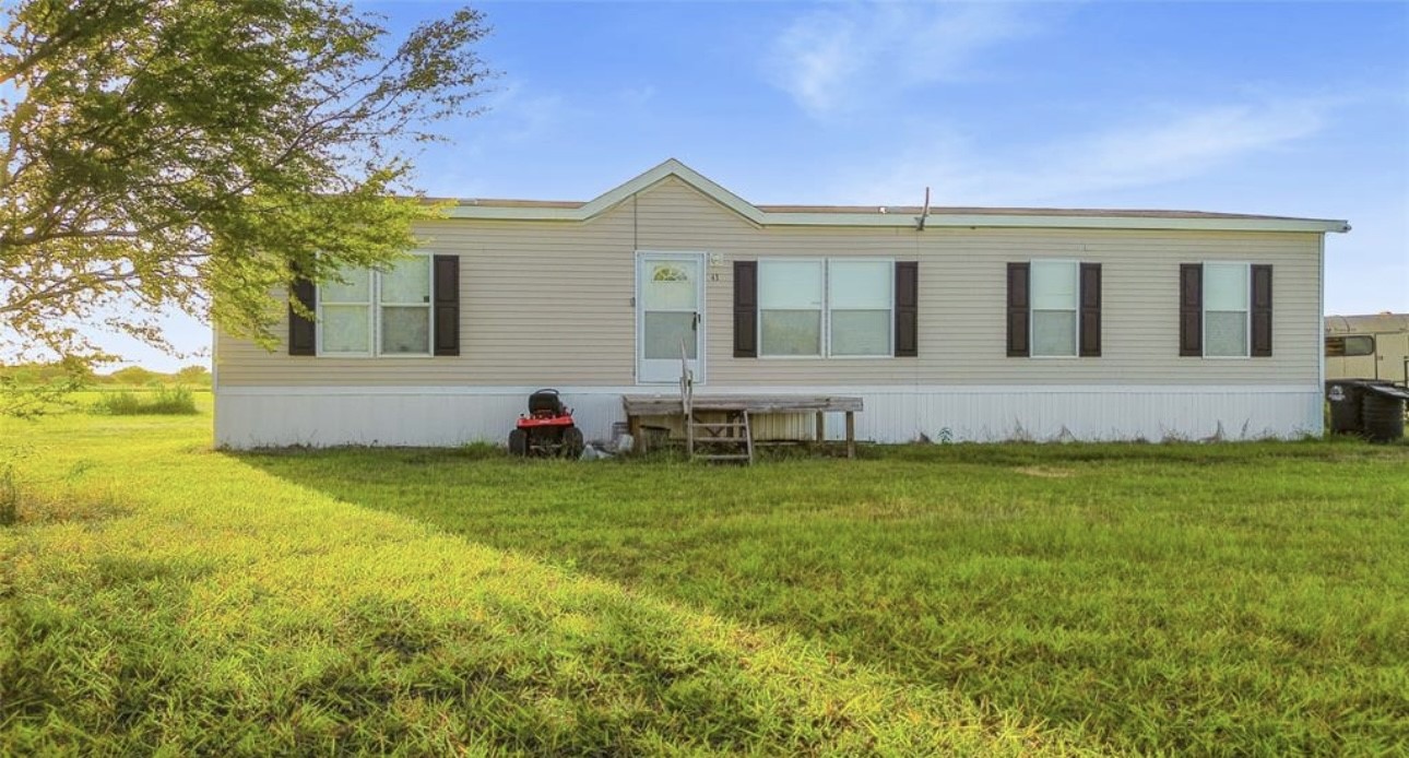 43 Ironwood Road Victoria, TX 77904 - Photo 1 of 21 a view of a house with a backyard