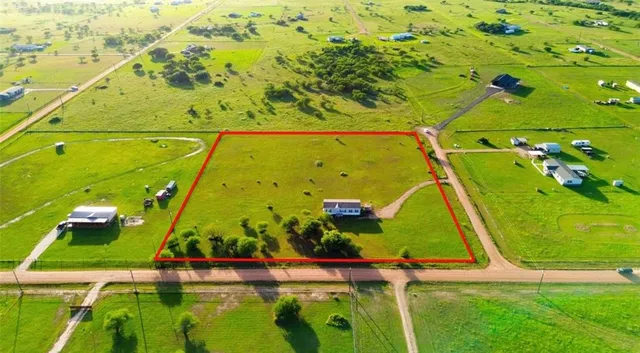 a backyard of a house with seating space