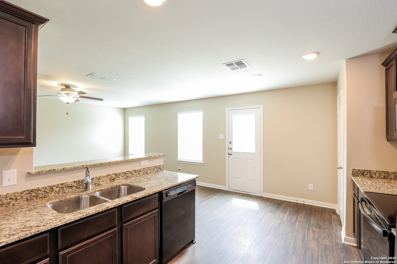 7213 Romaire San Antonio, TX 78252 - Photo 2 of 15 a bathroom with a sink and a mirror