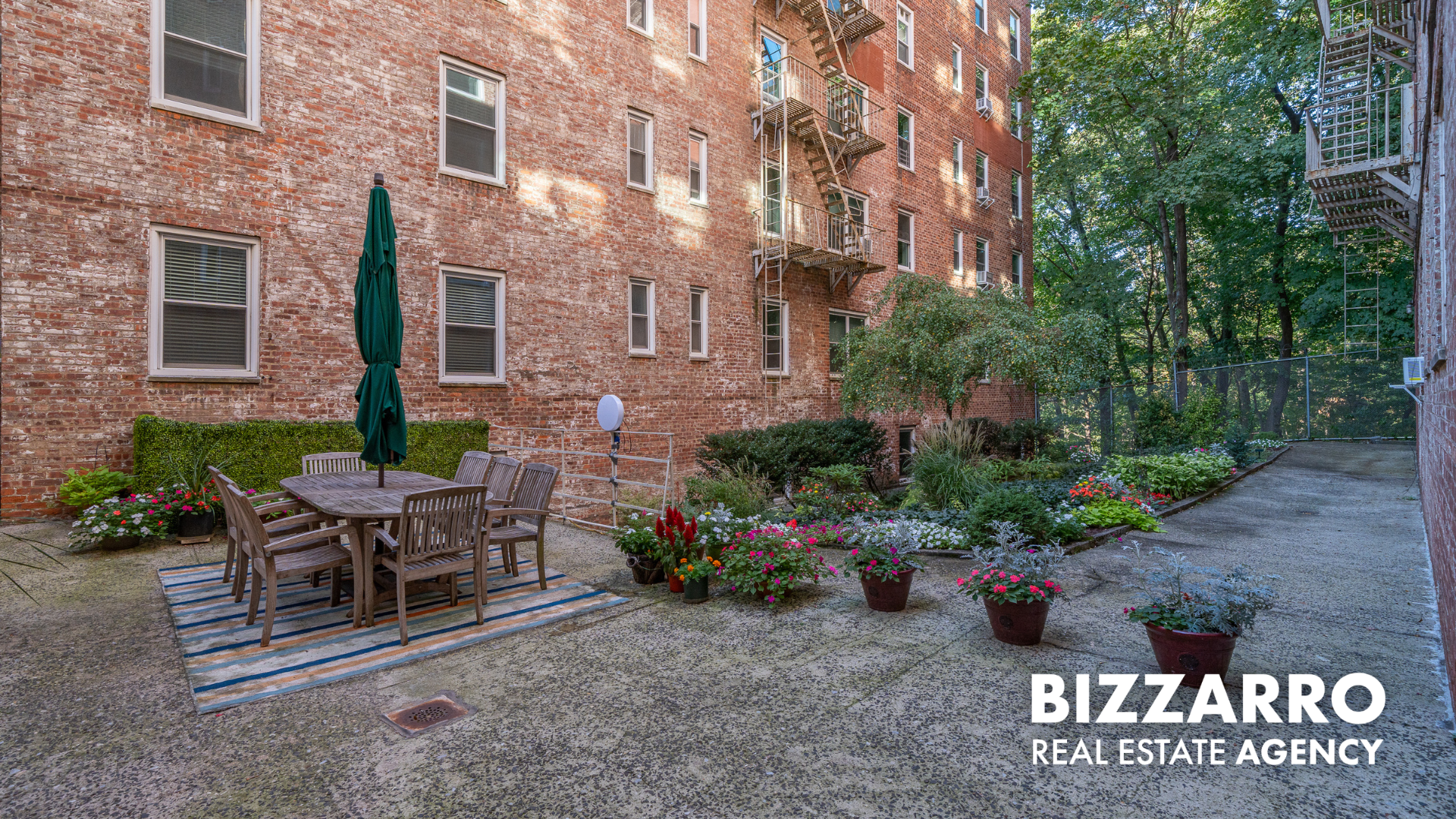 360 Cabrini Boulevard, Unit 3I Manhattan, NY 10040 - Photo 10 of 11 a view of a patio with a table and chairs and plants