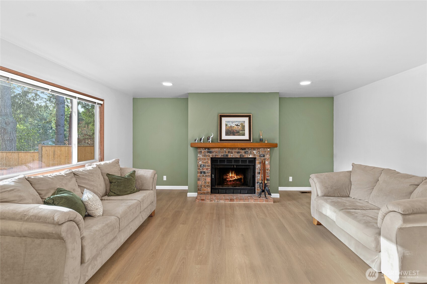 5824 111th Place Southwest Mukilteo, WA 98275 - Photo 11 of 38 a living room with furniture and a fireplace