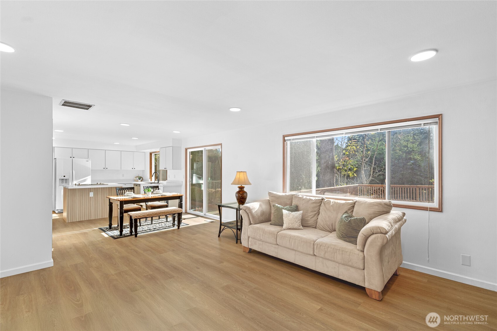 5824 111th Place Southwest Mukilteo, WA 98275 - Photo 13 of 38 a living room with furniture and a table