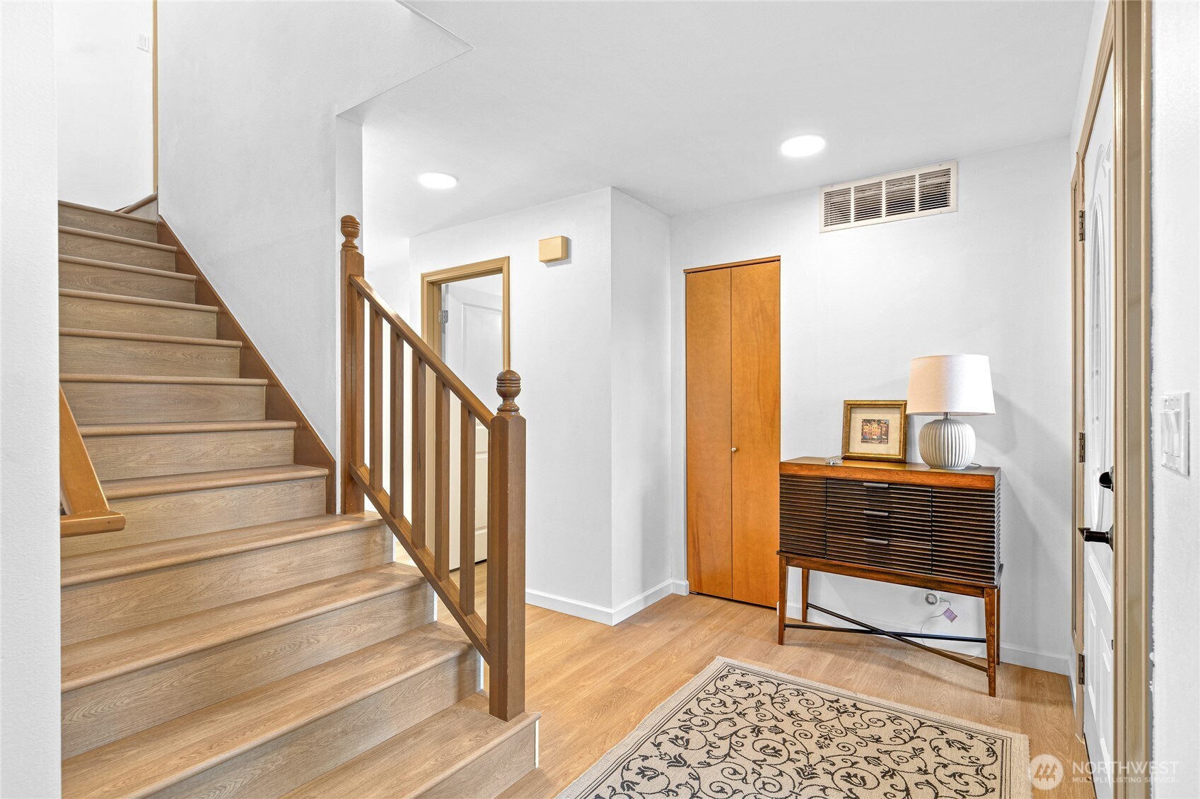 5824 111th Place Southwest Mukilteo, WA 98275 - Photo 15 of 38 a view of an entryway with wooden floor