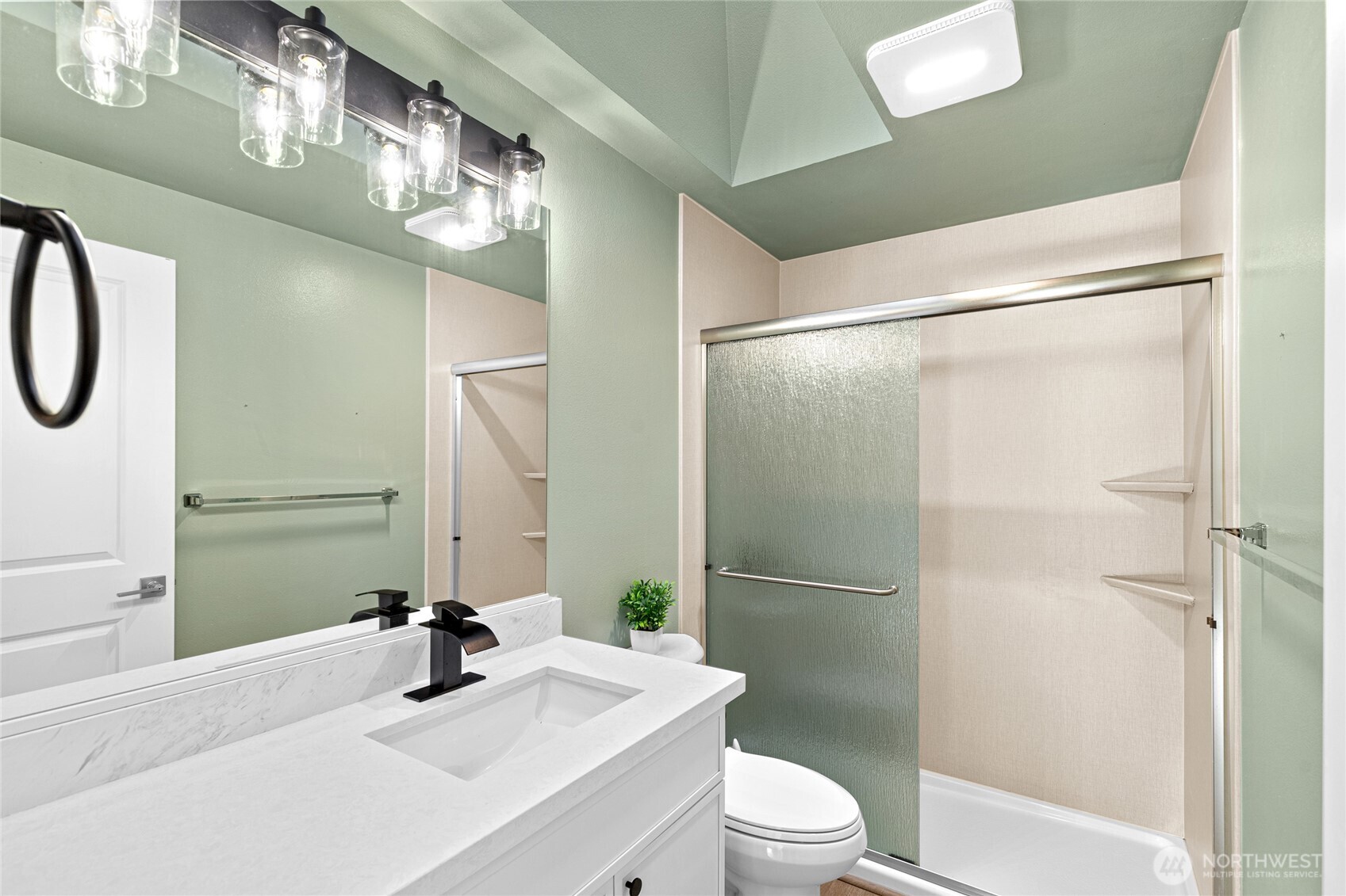 5824 111th Place Southwest Mukilteo, WA 98275 - Photo 20 of 38 a bathroom with a sink a toilet and shower