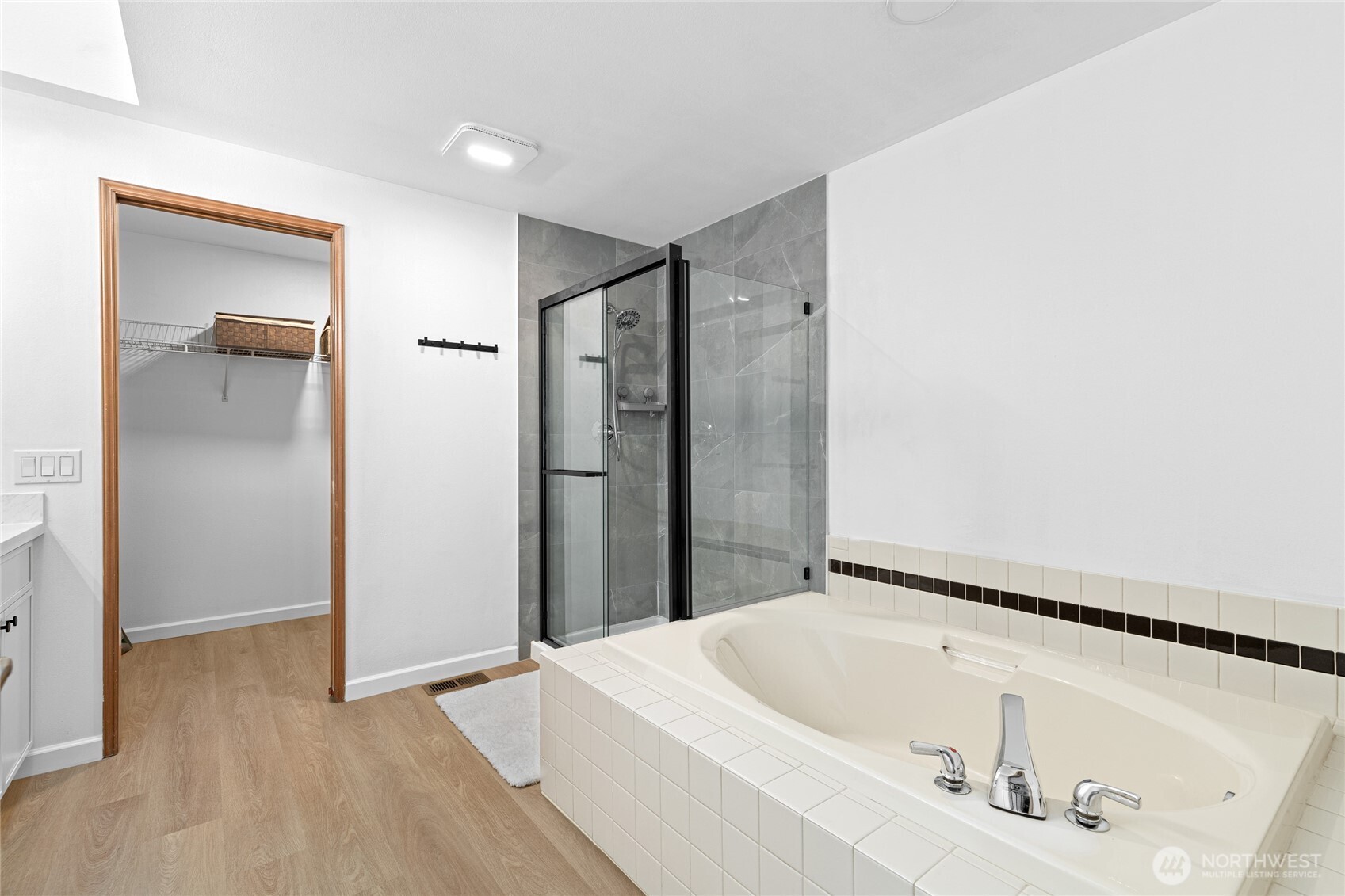 5824 111th Place Southwest Mukilteo, WA 98275 - Photo 24 of 38 a bathroom with a bathtub and a shower