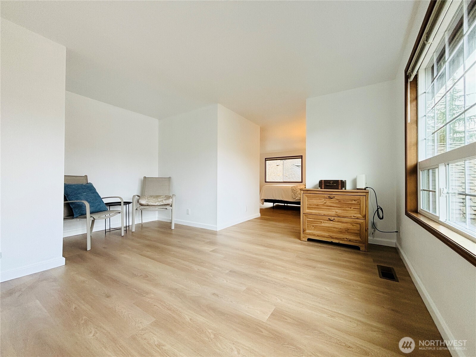 5824 111th Place Southwest Mukilteo, WA 98275 - Photo 26 of 38 a living room with furniture and a large window