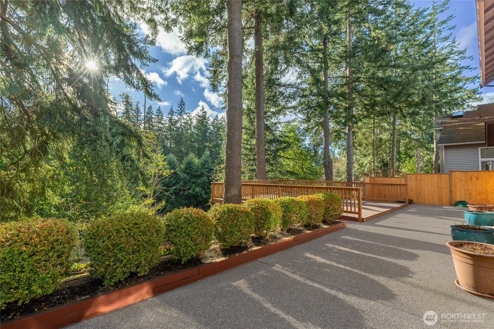 5824 111th Place Southwest Mukilteo, WA 98275 - Photo 28 of 38 a backyard of a house with lots of green space