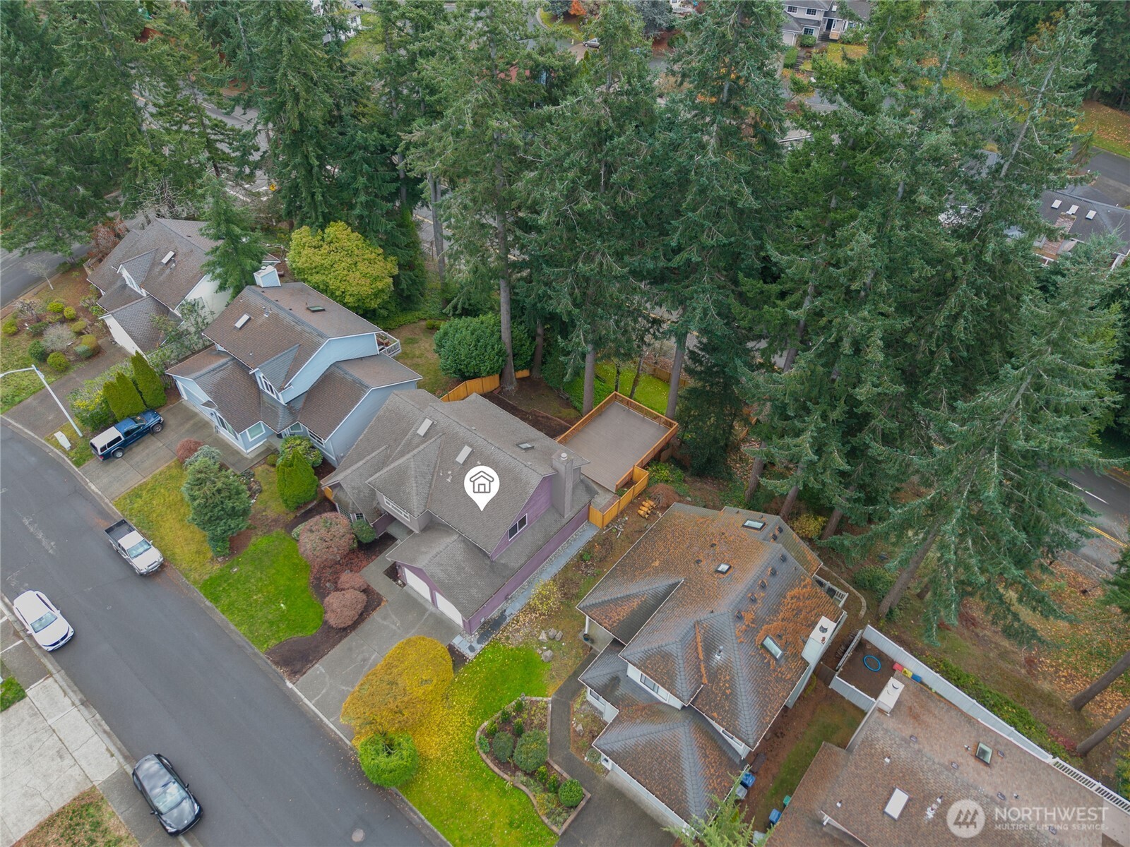 5824 111th Place Southwest Mukilteo, WA 98275 - Photo 31 of 38 an aerial view of a house with a yard and lake view