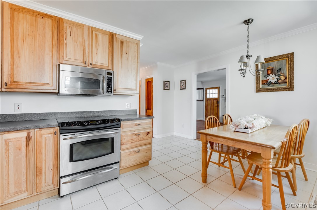 1910 Seddon Road Richmond, VA 23227 - Photo 14 of 39 a kitchen with stainless steel appliances granite countertop a stove a sink dishwasher and a microwave
