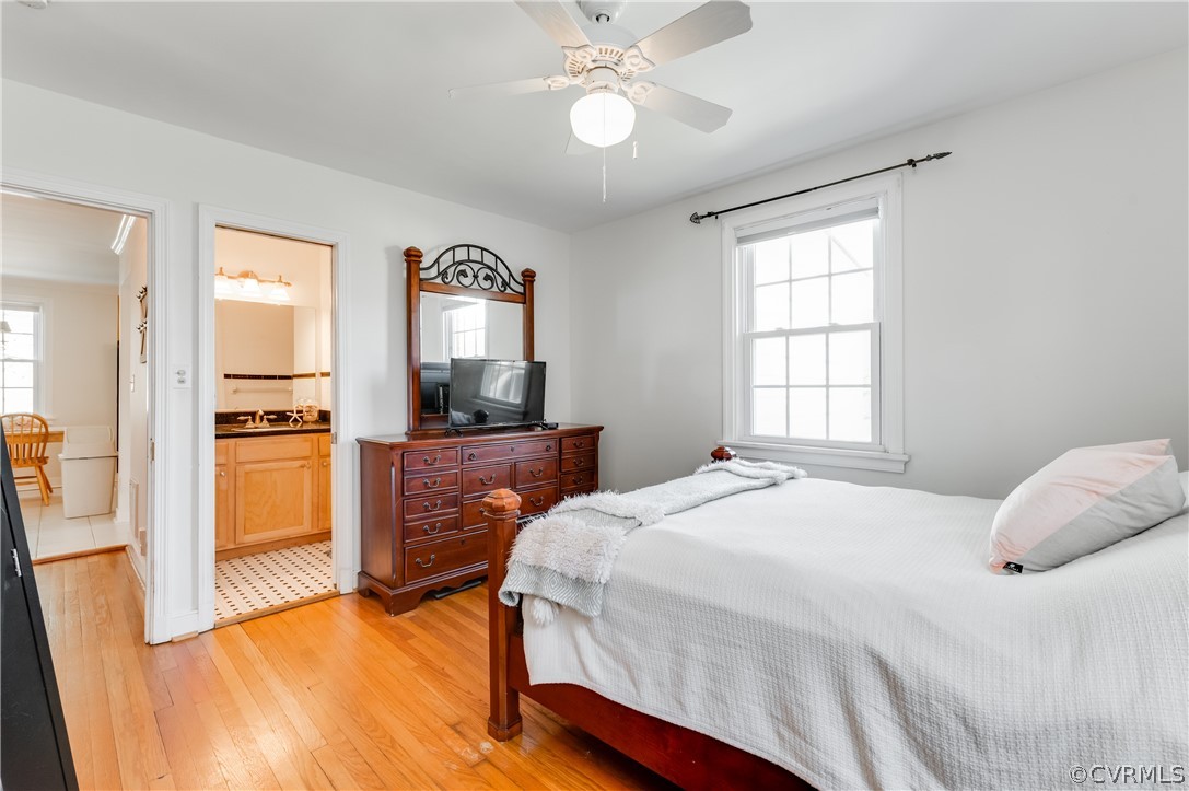1910 Seddon Road Richmond, VA 23227 - Photo 19 of 39 a bedroom with a bed and a view of kitchen