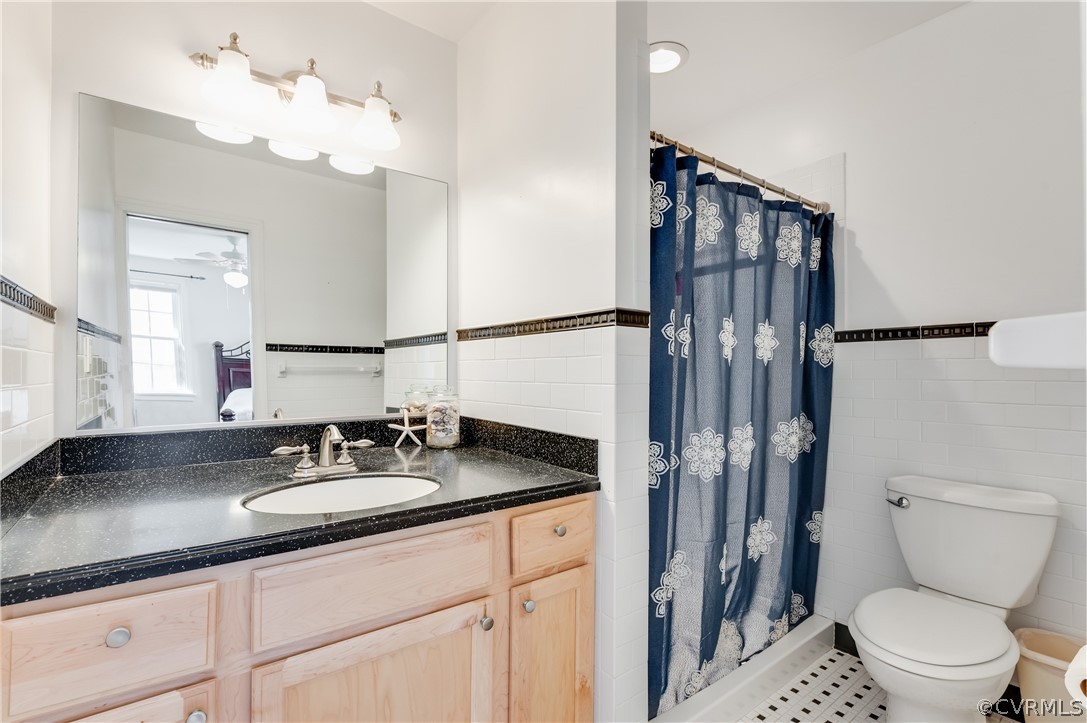 1910 Seddon Road Richmond, VA 23227 - Photo 20 of 39 a bathroom with a granite countertop sink toilet and shower