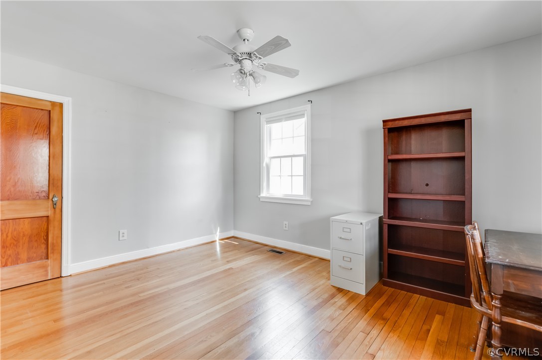 1910 Seddon Road Richmond, VA 23227 - Photo 22 of 39 a view of an empty room with a window