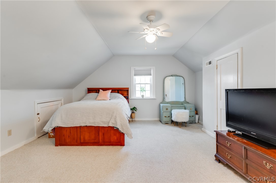 1910 Seddon Road Richmond, VA 23227 - Photo 23 of 39 a bedroom with a bed and a flat screen tv
