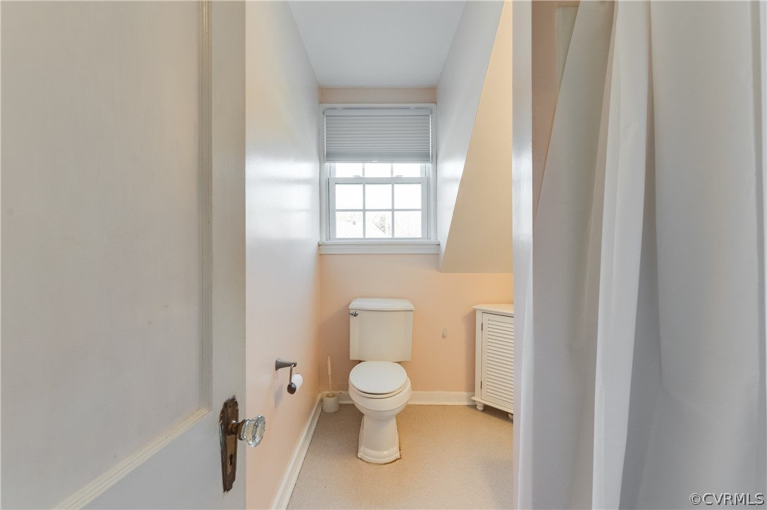 1910 Seddon Road Richmond, VA 23227 - Photo 28 of 39 a bathroom with a toilet and a window