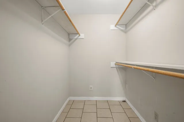 a view of a room with racks on the wall