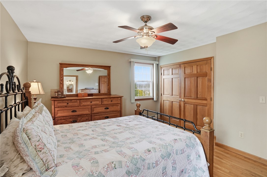 24 Sandy Lane Bristol, RI 02809 - Photo 13 of 27 Primary is sun-filled with ample closet space.