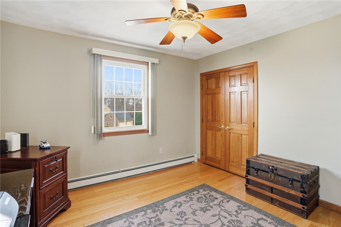 24 Sandy Lane Bristol, RI 02809 - Photo 15 of 27 Second bedroom across from primary currently used as office.