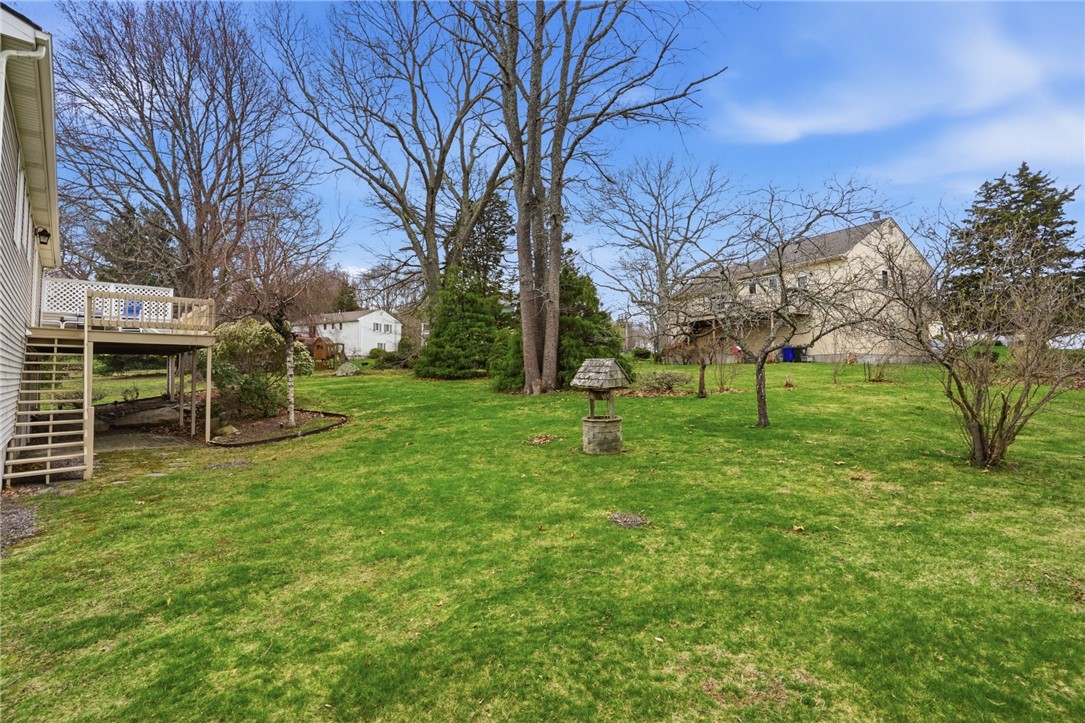 24 Sandy Lane Bristol, RI 02809 - Photo 25 of 27 Delightful southern facing expansive backyard.