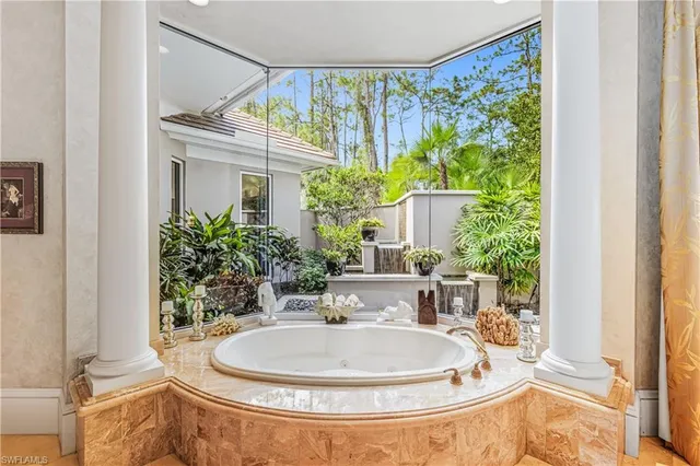 a dining room with a table and chairs