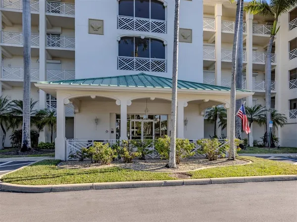 front view of a building with a swimming pool