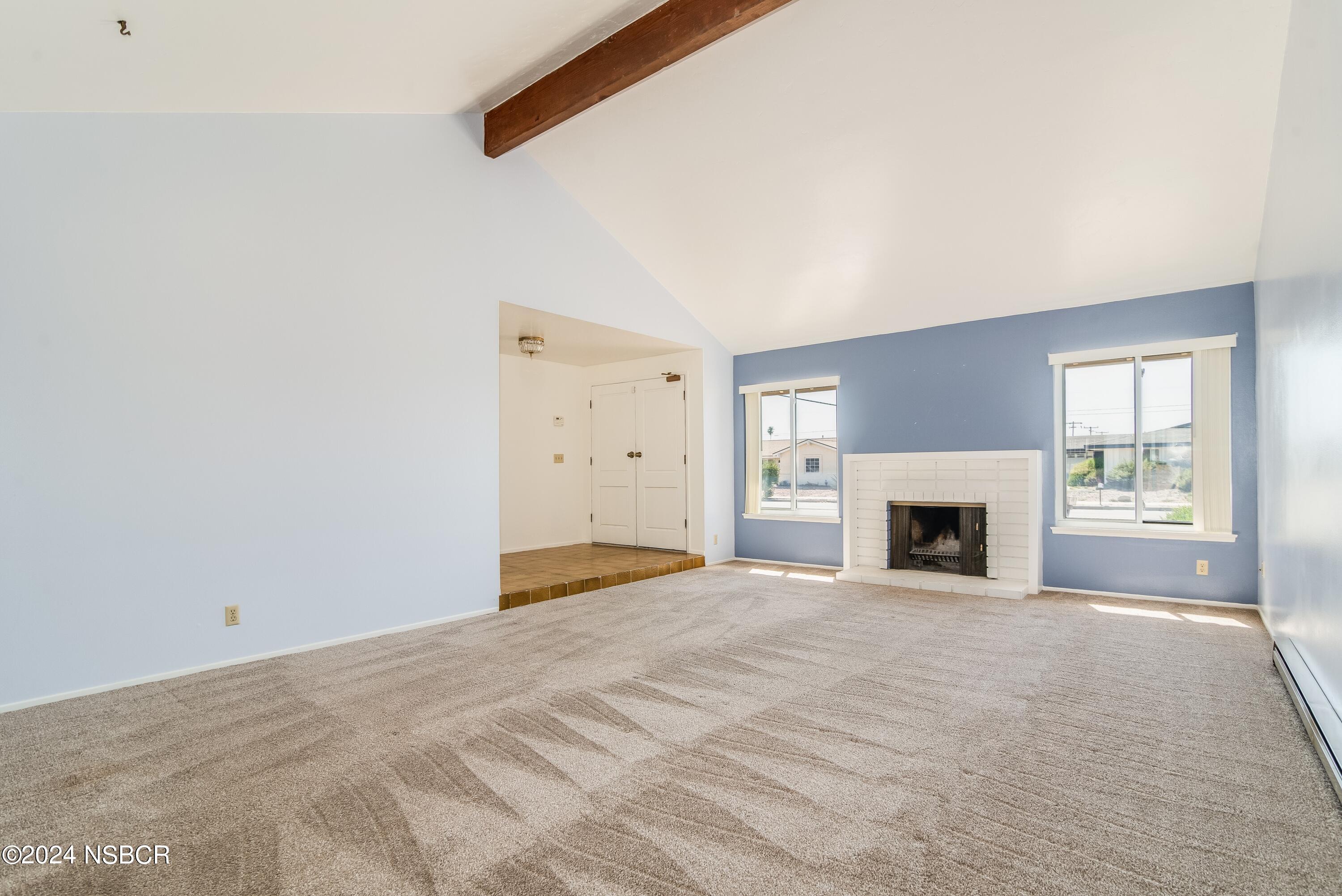 4149 Constellation Road Lompoc, CA 93436 - Photo 12 of 31 a view of empty room with a fireplace