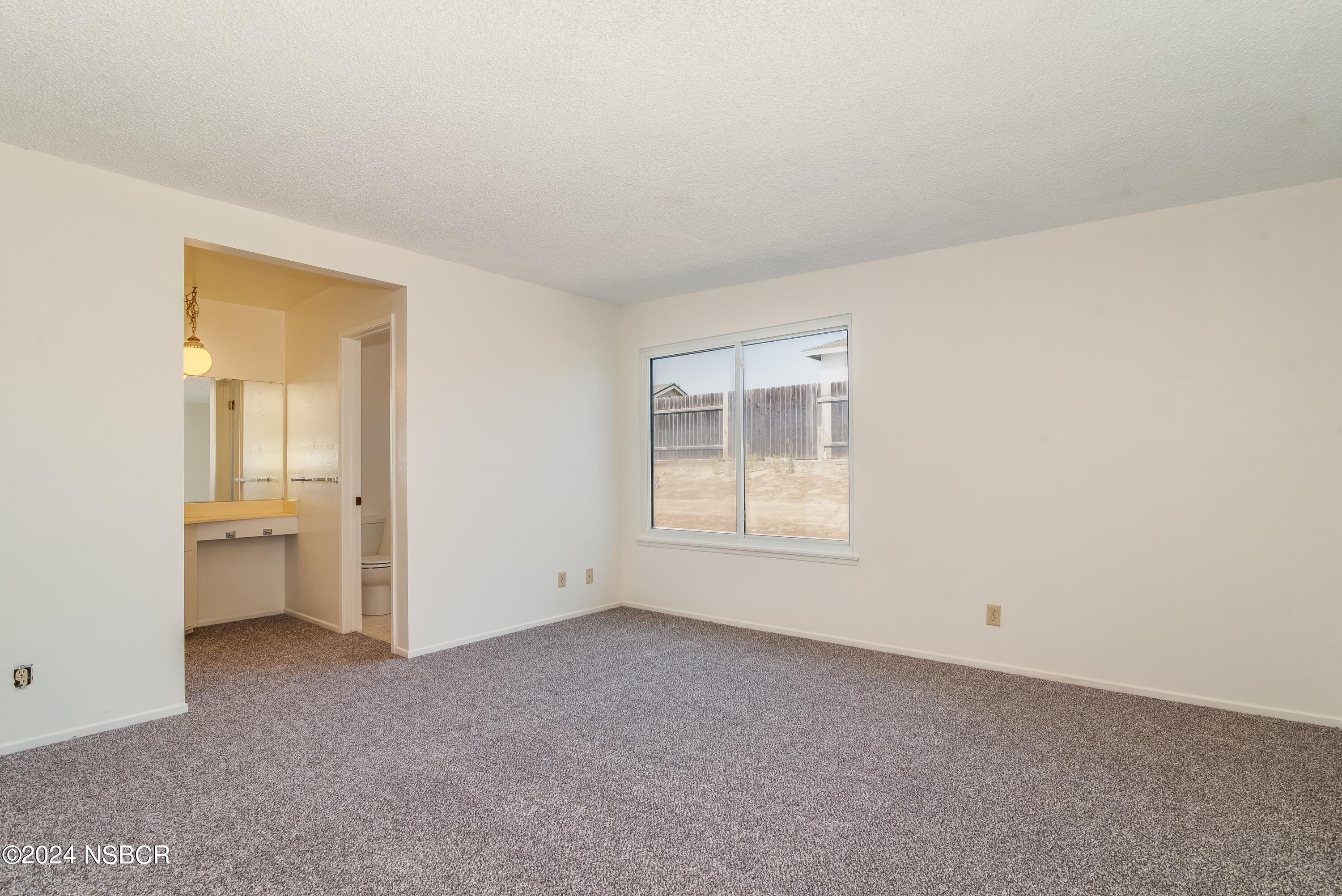 4149 Constellation Road Lompoc, CA 93436 - Photo 14 of 31 an empty room with windows
