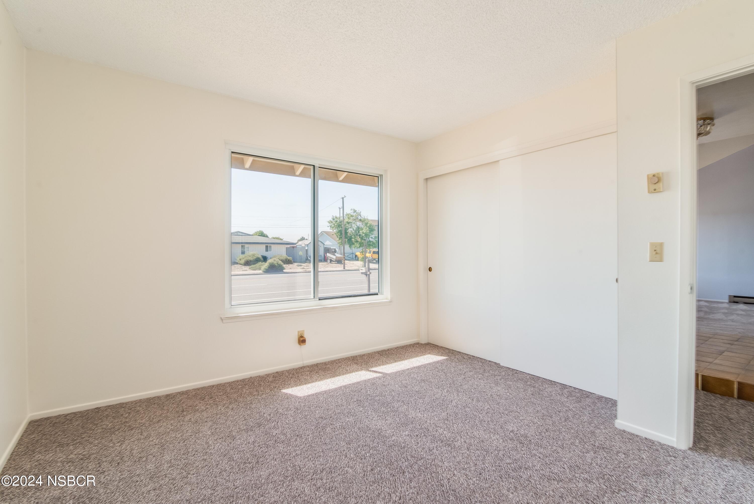 4149 Constellation Road Lompoc, CA 93436 - Photo 20 of 31 an empty room with a window