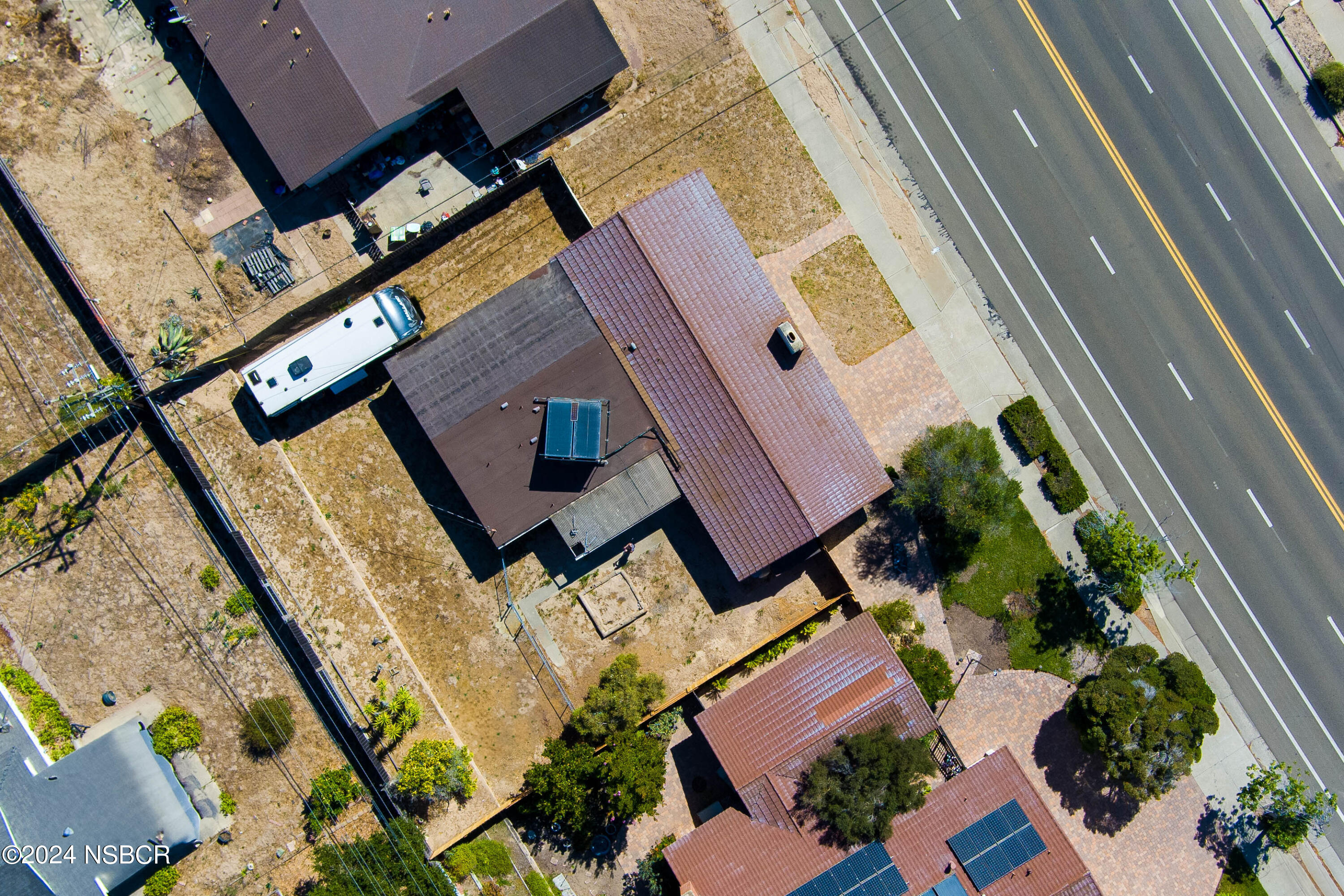 4149 Constellation Road Lompoc, CA 93436 - Photo 2 of 31 an aerial view of a house with a yard