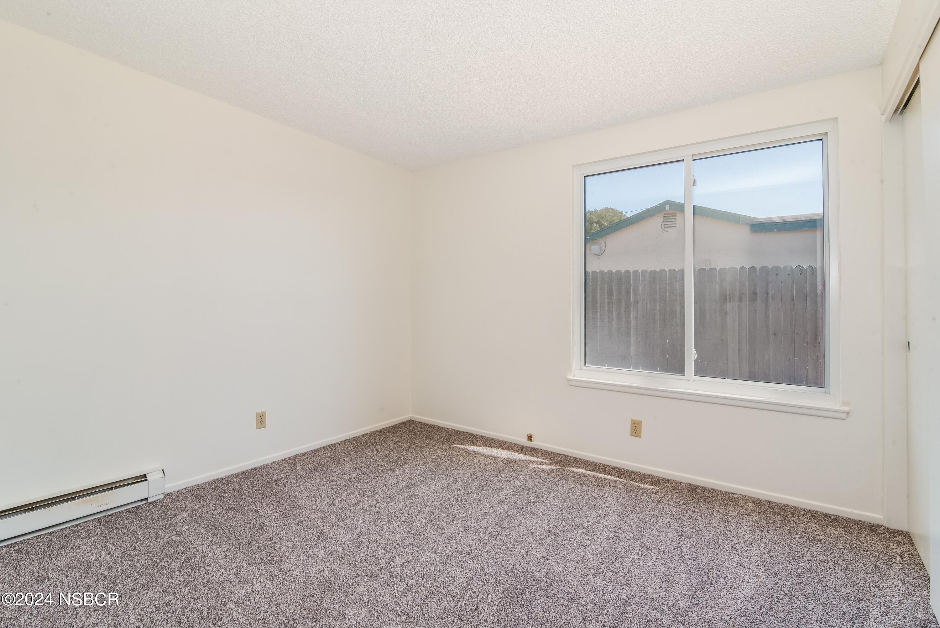 4149 Constellation Road Lompoc, CA 93436 - Photo 21 of 31 an empty room with a window