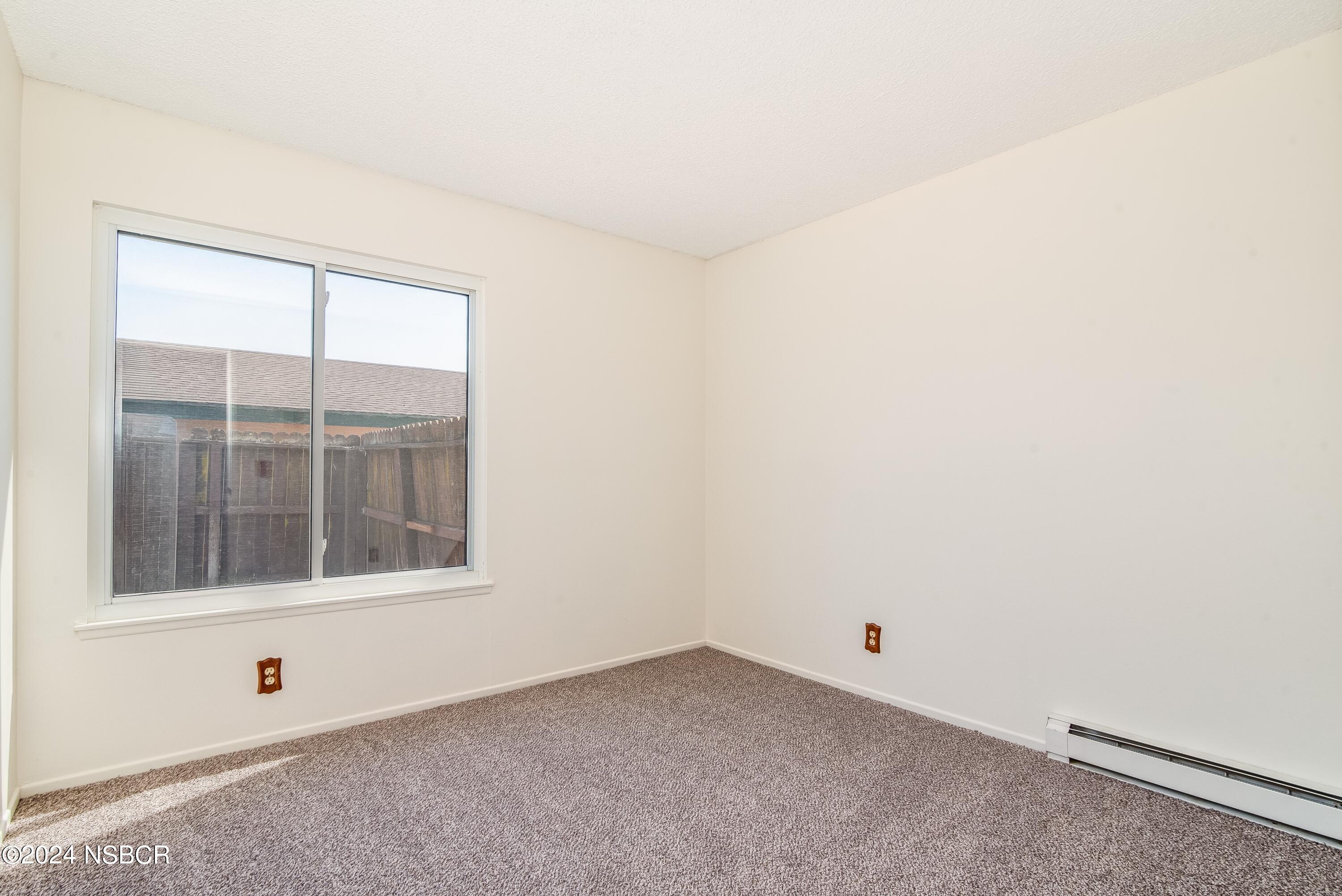 4149 Constellation Road Lompoc, CA 93436 - Photo 22 of 31 an empty room with a window