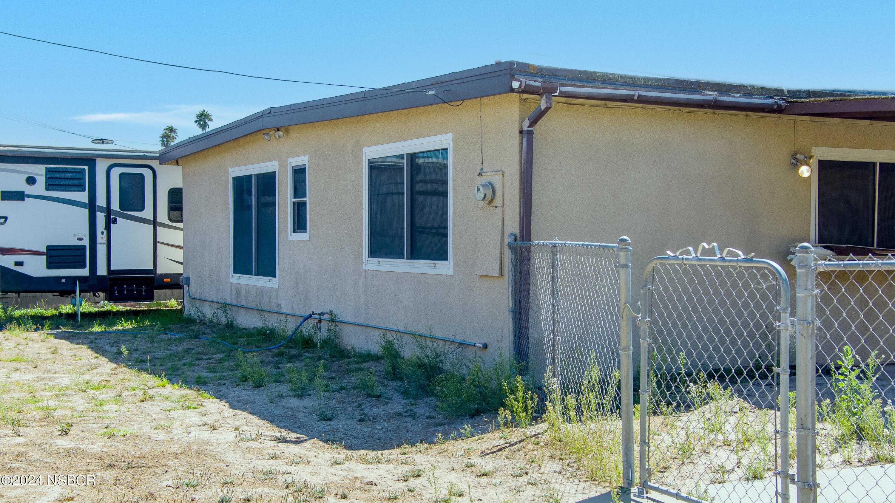 4149 Constellation Road Lompoc, CA 93436 - Photo 28 of 31 a front view of a house having yard