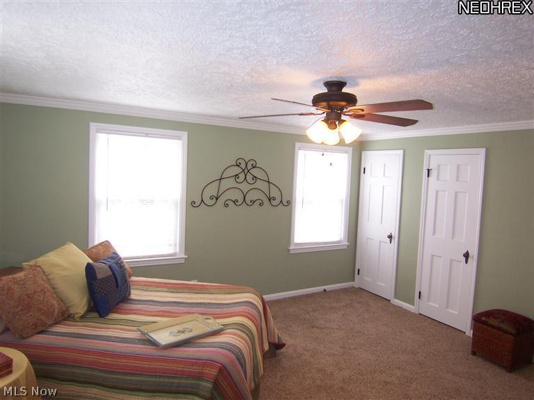 4089 Bushnell Road University Heights, OH 44121 - Photo 13 of 25 Master Bedroom view 2 with Crown Molding and Ceiling Fan
