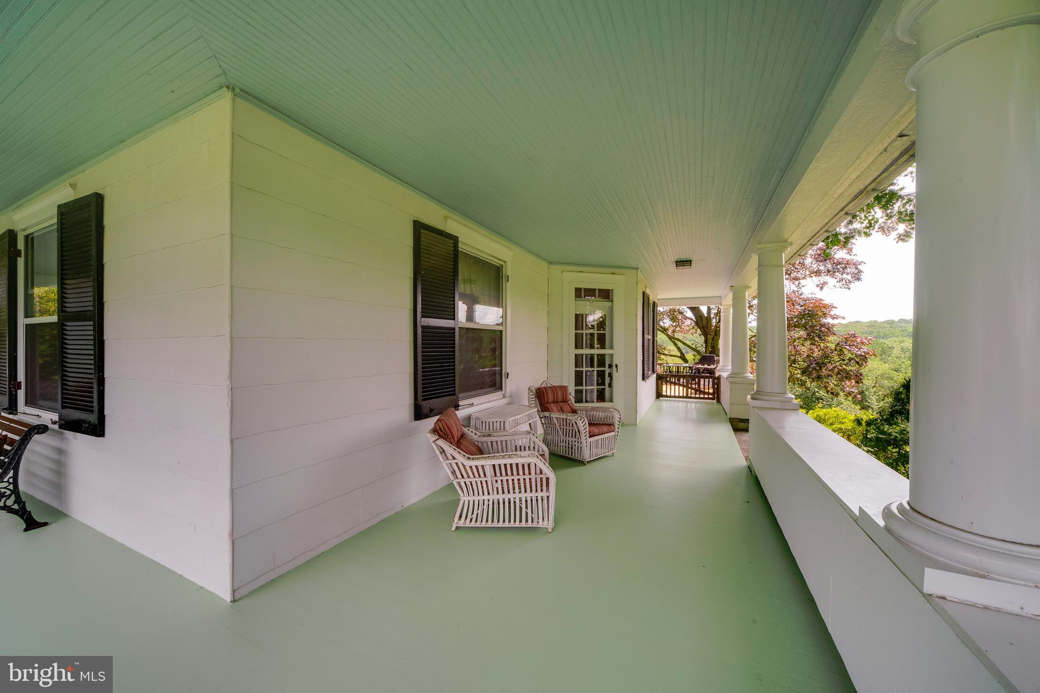 4301 Federal Hill Road Street, MD 21154 - Photo 48 of 85 Side View of Wrap-a-round Porch in Main House