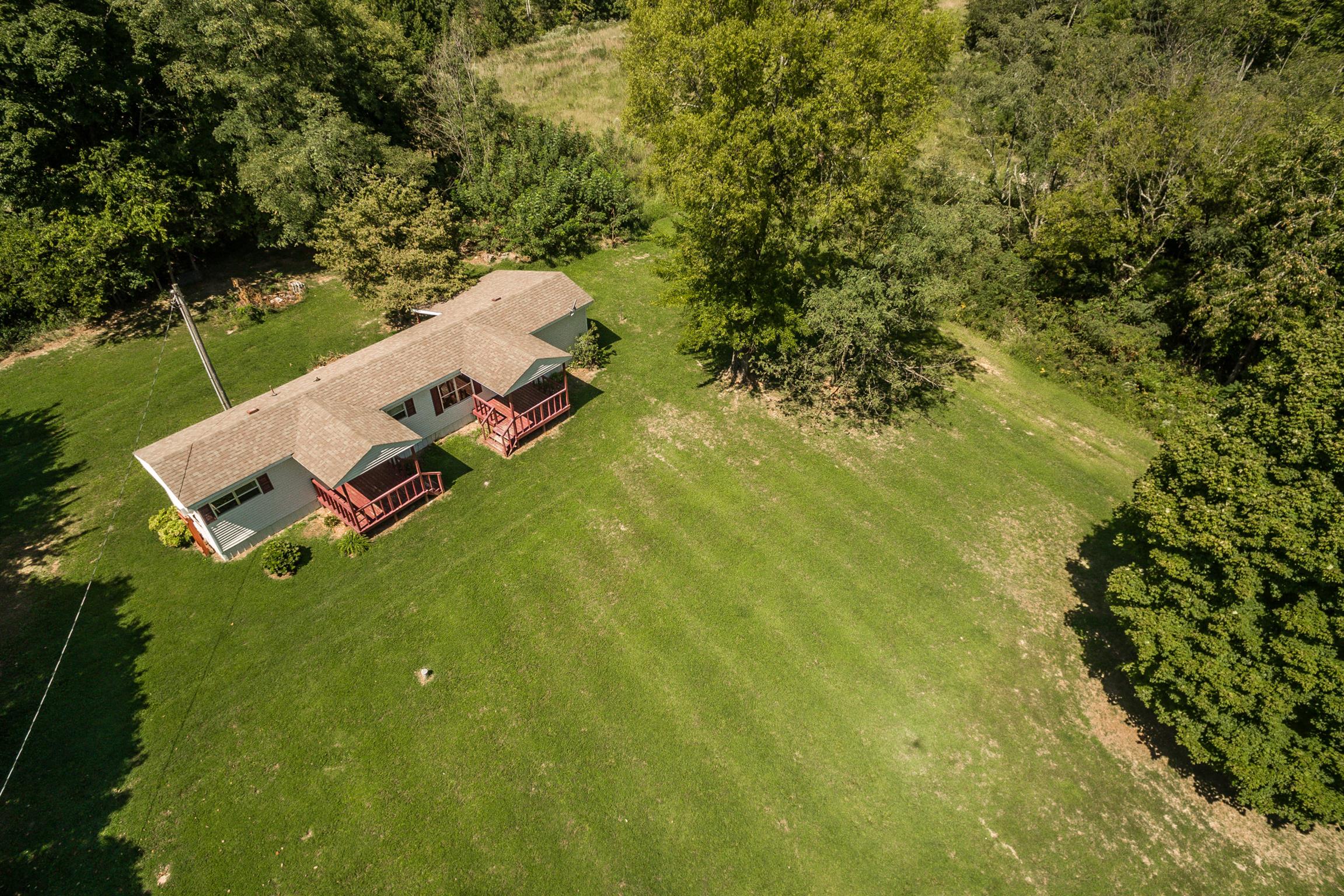 1560 Reese Road Bethpage, TN 37022 - Photo 3 of 22 a view of a lake with houses