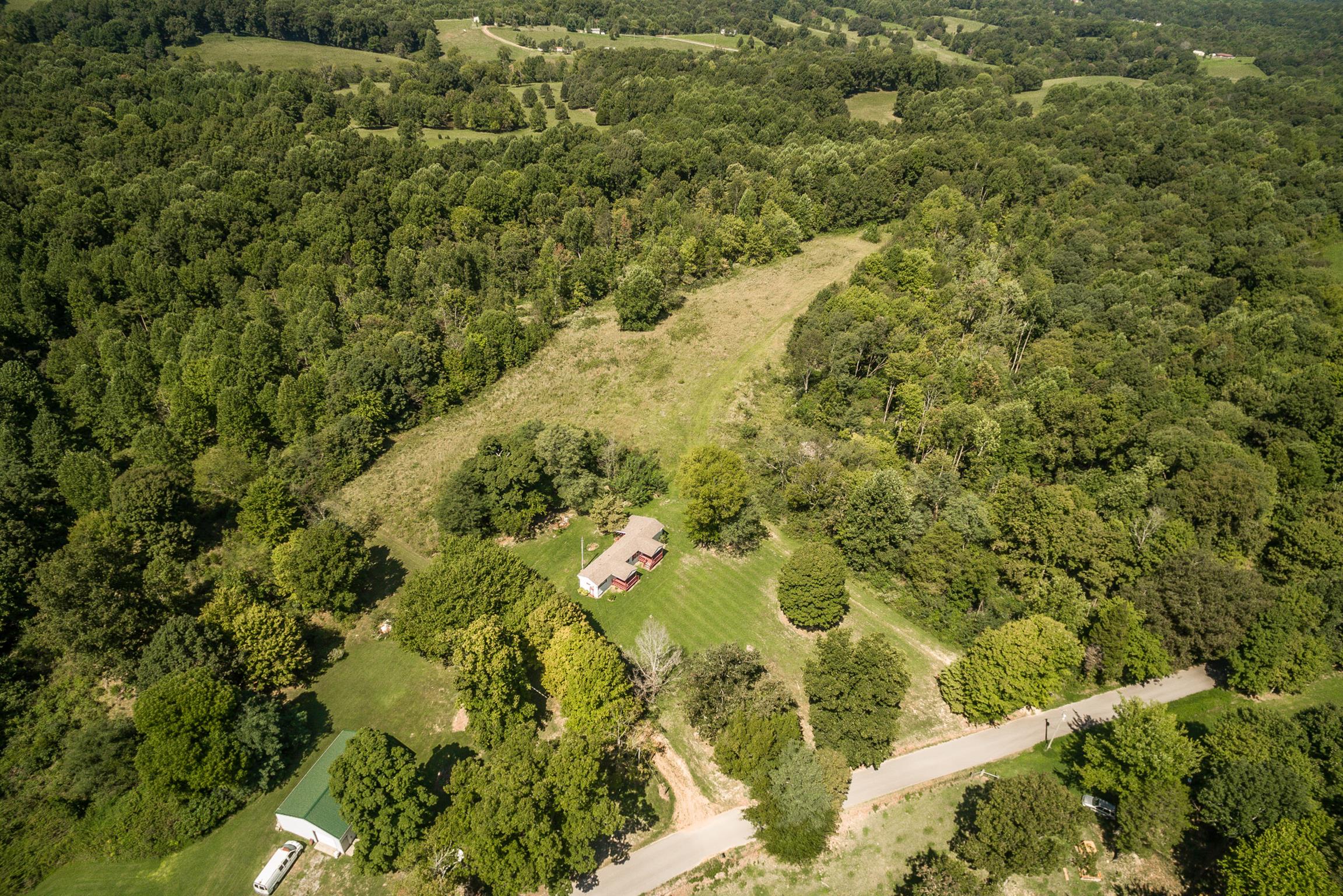 1560 Reese Road Bethpage, TN 37022 - Photo 5 of 22 a view of a yard with a house