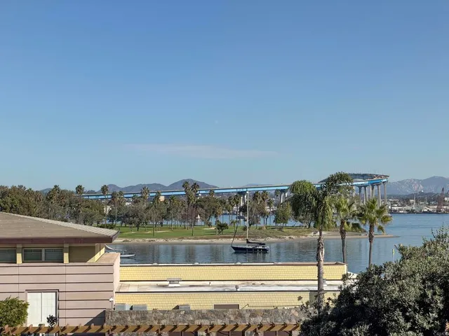 a view of river and city from balcony