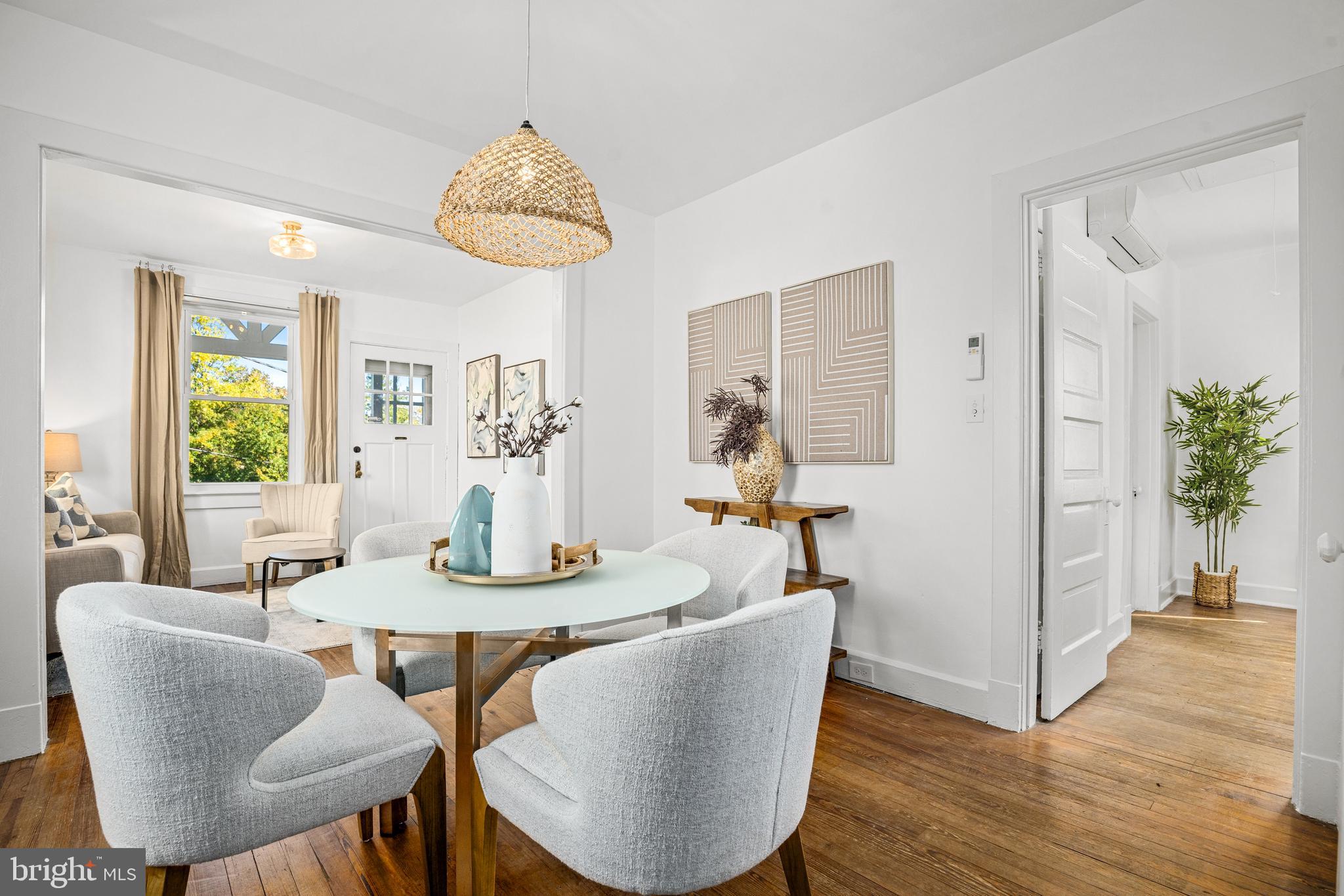 1327 Irving Street Northeast Washington, DC 20017 - Photo 12 of 39 a view of a dining room with furniture window and wooden floor