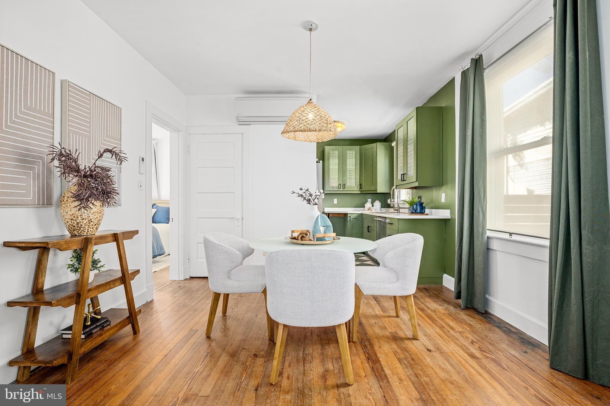 1327 Irving Street Northeast Washington, DC 20017 - Photo 10 of 39 a living room with furniture and a wooden floor