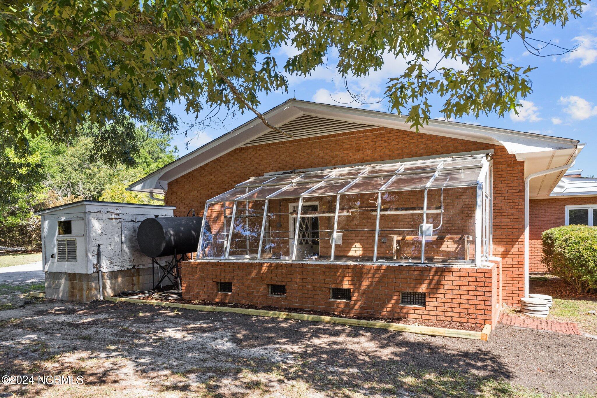 216 Oyster Lane Hubert, NC 28539 - Photo 65 of 80 Conservatory & Whole House Generator