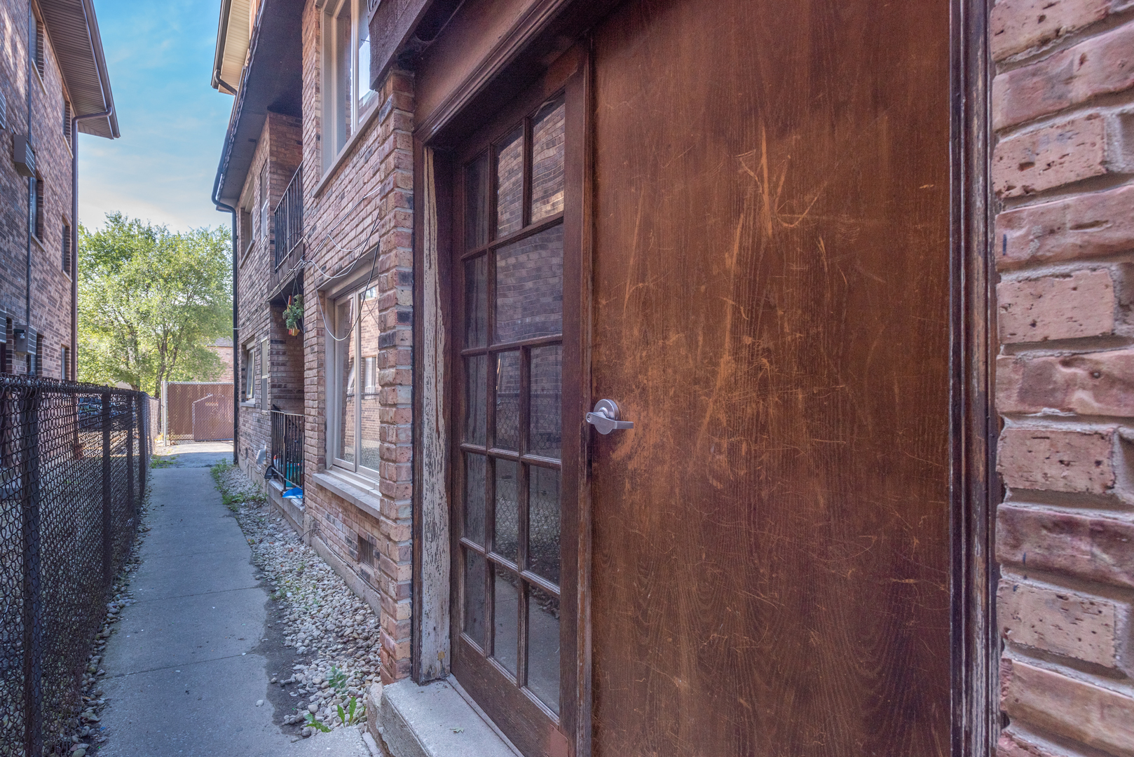 9708 Nottingham Avenue, Unit 5 Chicago Ridge, IL 60415 - Photo 2 of 16 a view of a brick house with a backyard of the house