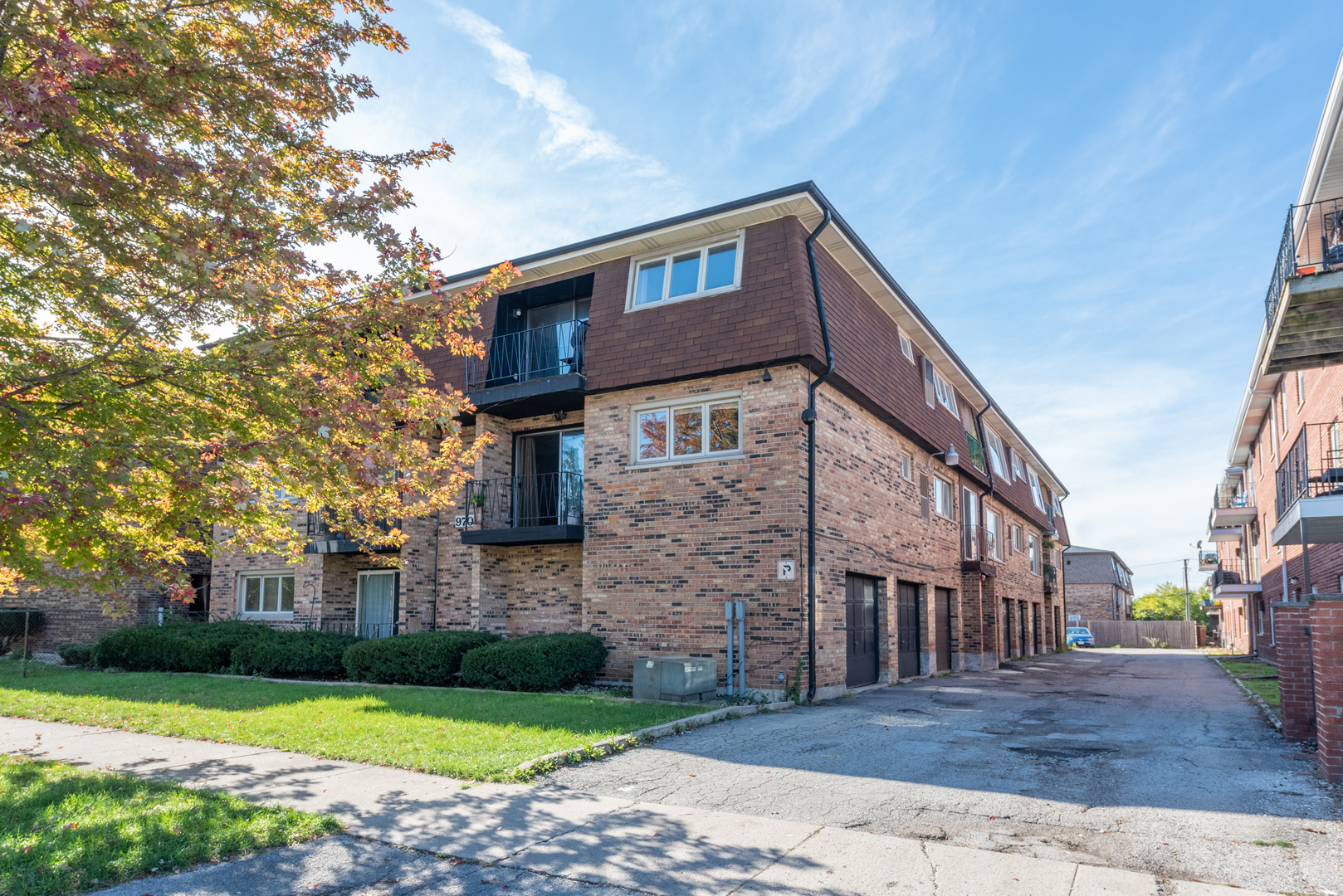 9708 Nottingham Avenue, Unit 5 Chicago Ridge, IL 60415 - Photo 16 of 16 a front view of a house with a yard