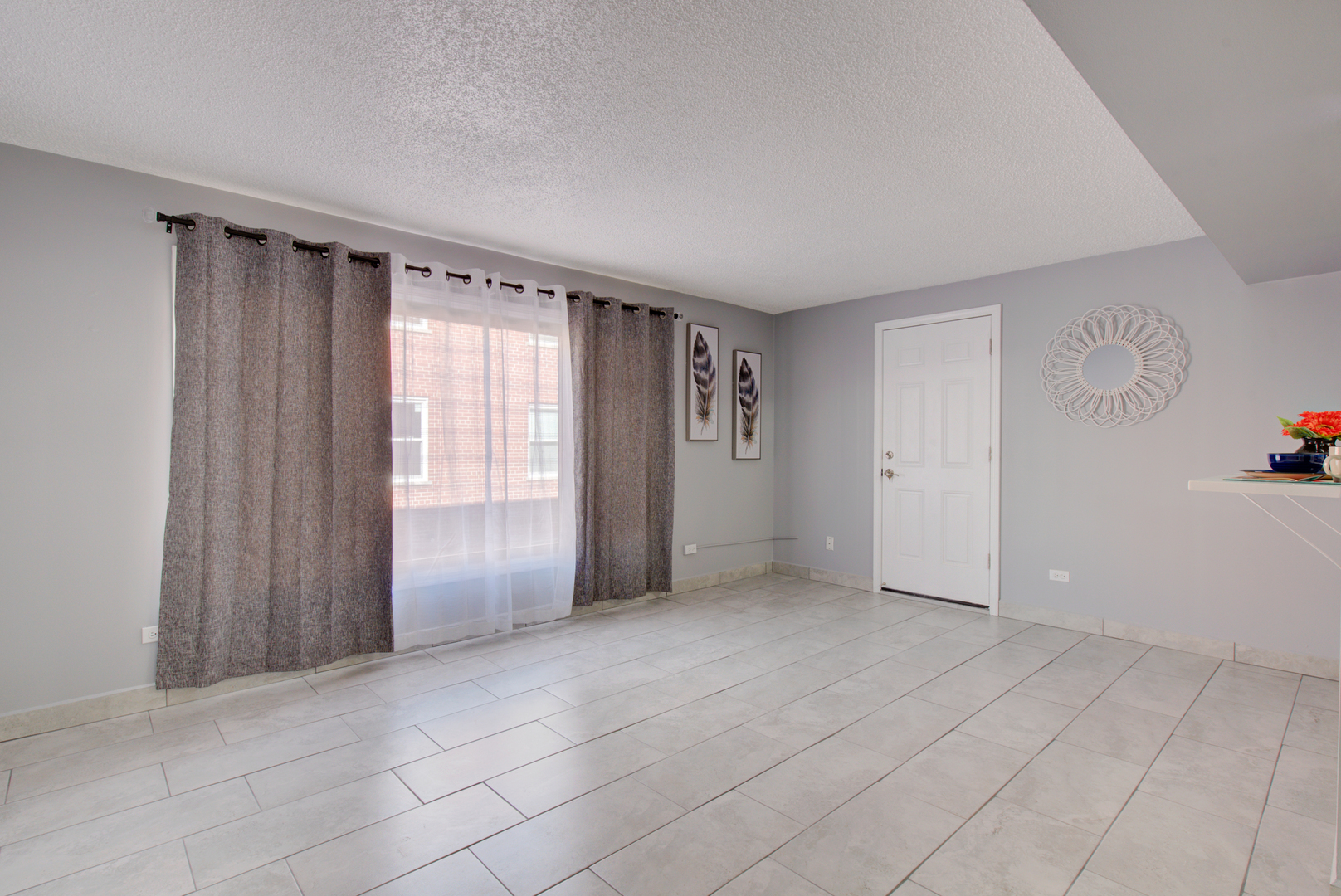9708 Nottingham Avenue, Unit 5 Chicago Ridge, IL 60415 - Photo 8 of 16 a view of an empty room with a window