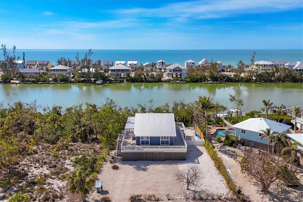 331 Bocilla Drive Boca Grande, FL 33921 - Photo 4 of 34 a view of a lake with and outdoor space