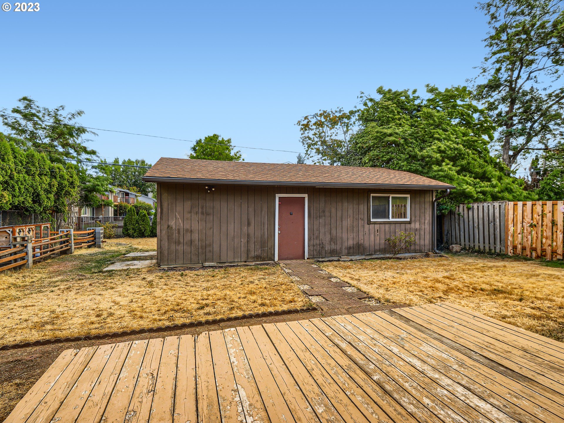 2546 Southeast 176th Place Portland, OR 97236 - Photo 19 of 24 a view of a house with a patio