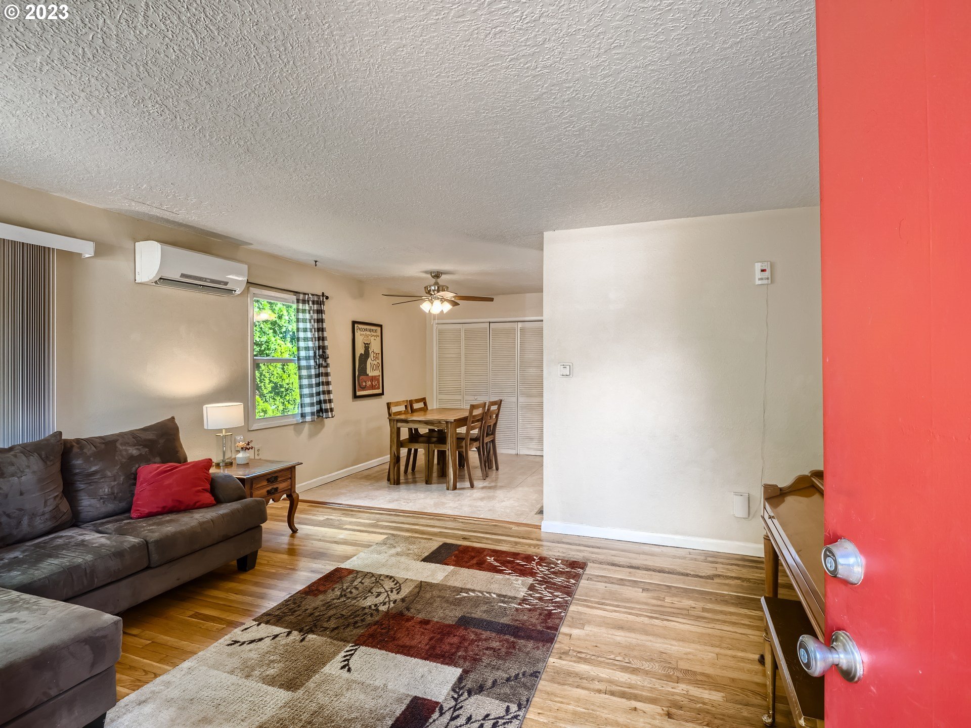 2546 Southeast 176th Place Portland, OR 97236 - Photo 4 of 24 a living room with furniture and a couch
