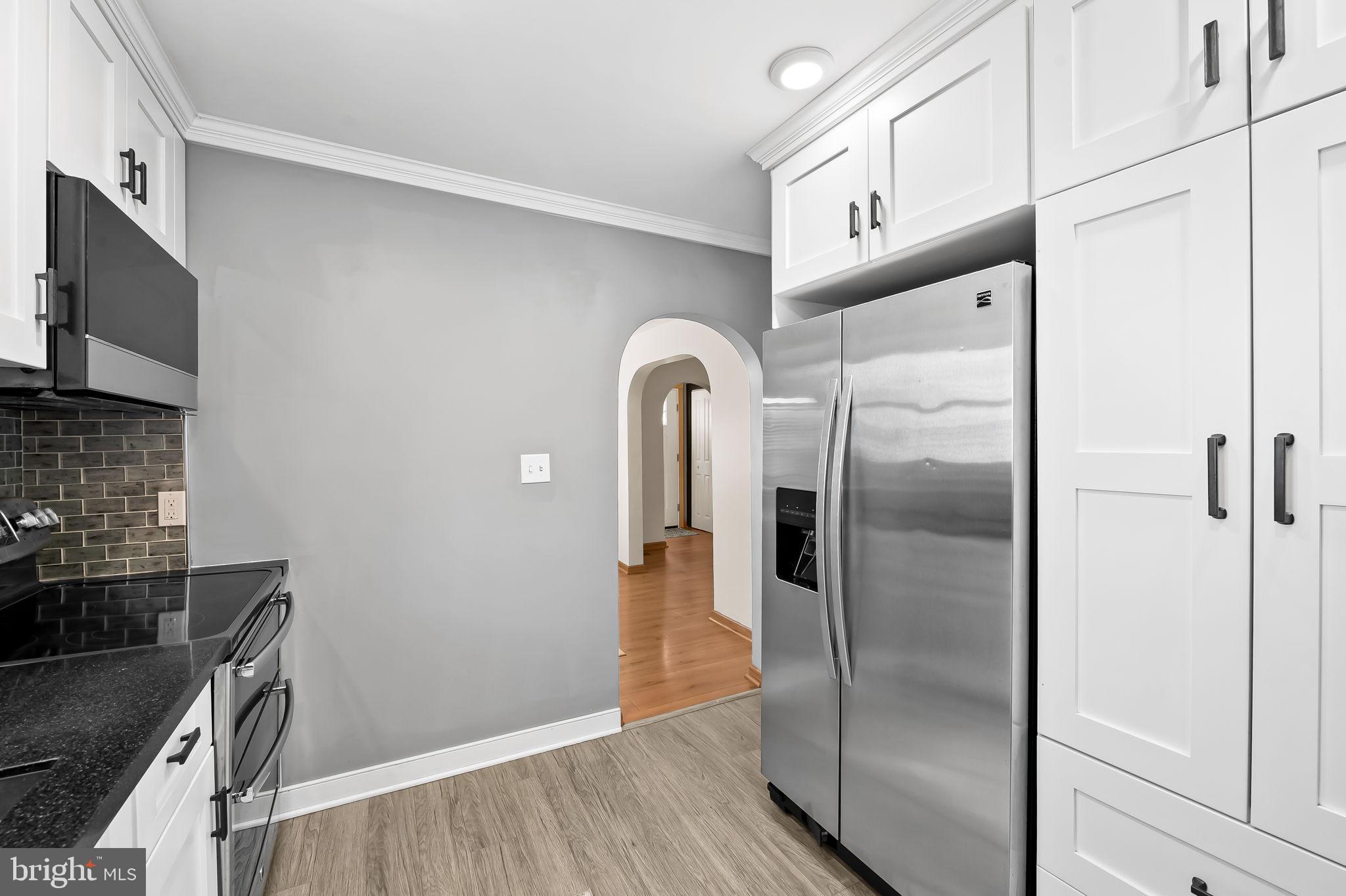 3332 Dublin Road Darlington, MD 21034 - Photo 16 of 39 a kitchen with stainless steel appliances granite countertop a refrigerator and a stove