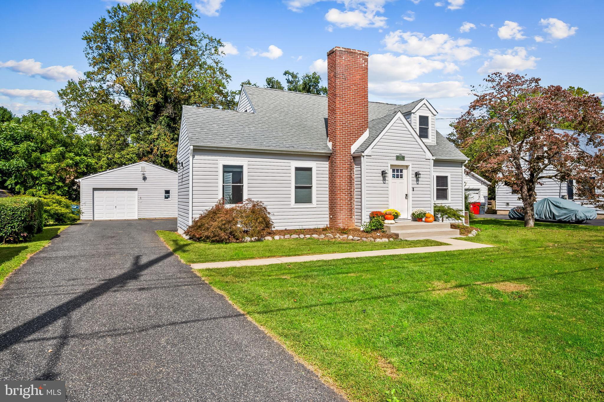 3332 Dublin Road Darlington, MD 21034 - Photo 2 of 39 a front view of a house with garden